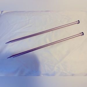 Size 15 aluminum knitting needles.